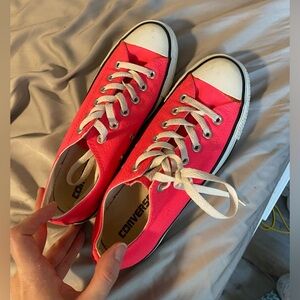 Hot pink low ride converse in women 8, men 6